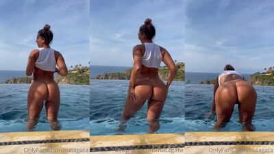 Natalia Garibotto pelada em publico lavando a buceta no rio