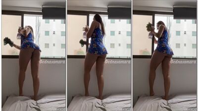 Edna Samara limpando a janela com a bunda grande empinada
