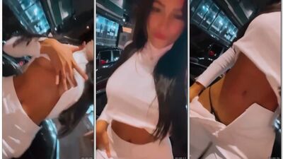 Karlyane Menezes moreninha gostosa e exibicionista mostrando os peitos na rua