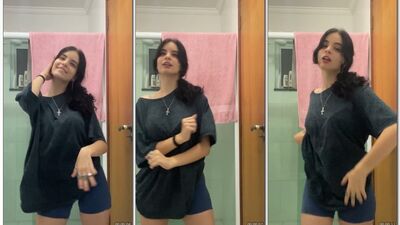 Julia Bates dançando tiktok com os peitos balançando