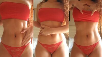Redhead provocando enquanto passa creme no corpinho