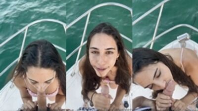 Izzy Green pagando boquete dentro de uma lancha