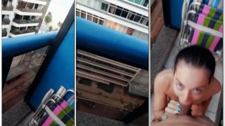 Xigisa aproveita a vista da sacada e começa a pagar um boquetão bem gostoso pra seu macho ao ar livre